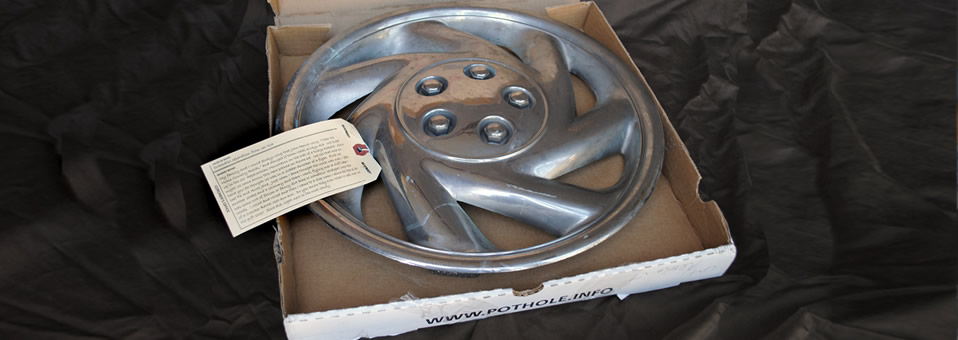 Read the stories of deceased hubcaps.